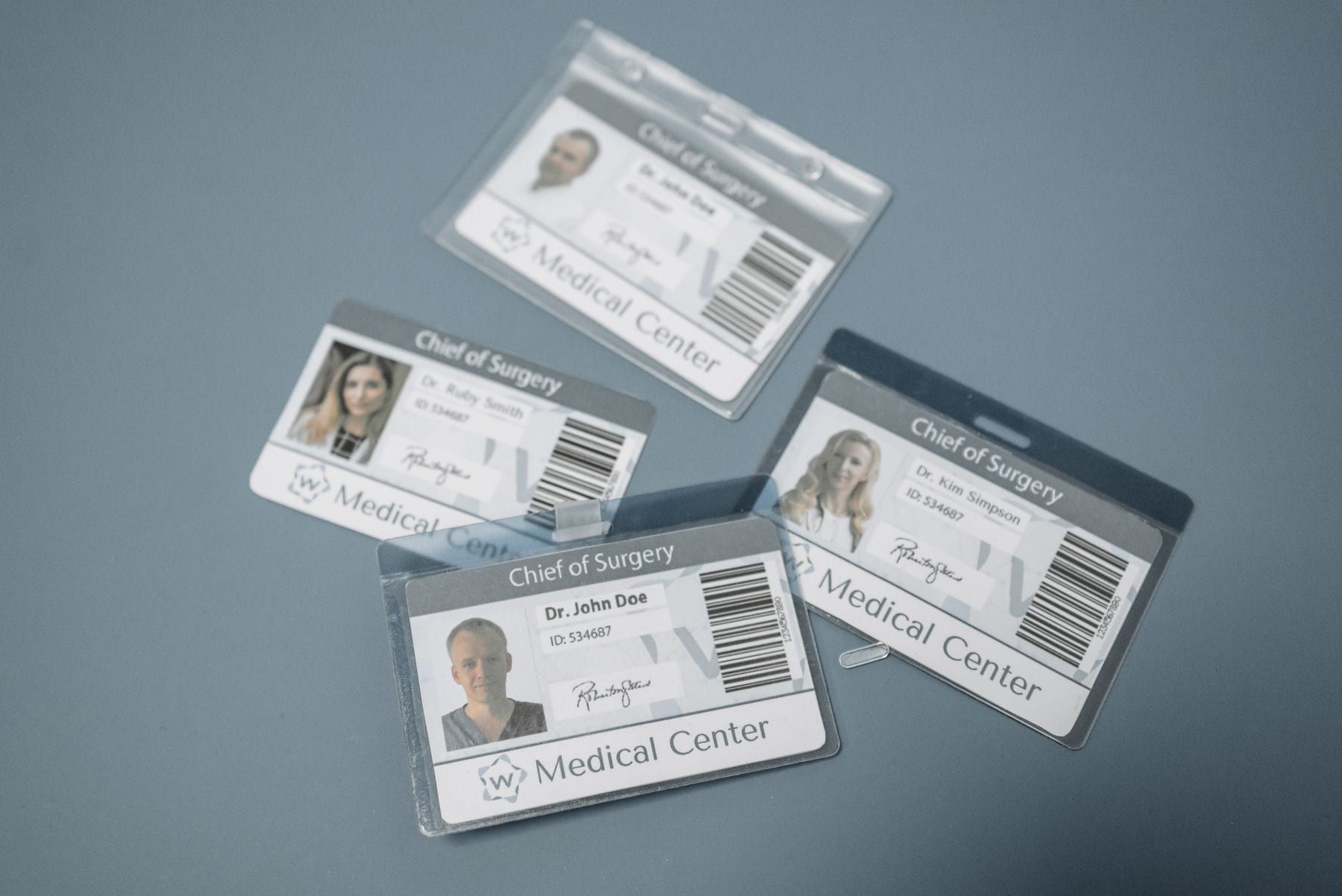 Name badges laid out on a surface